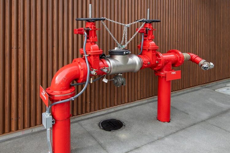 Red commercial backflow preventer.