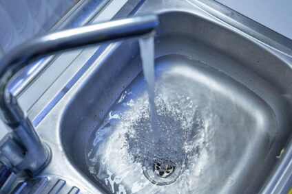 Kitchen sink running but not draining.