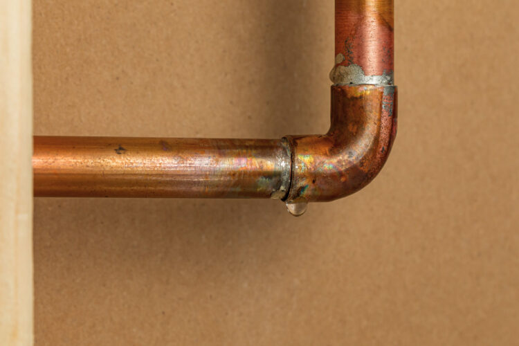 Copper plumbing line leaking at the joint.
