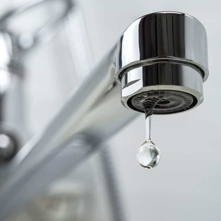 Dripping Faucet Stock Photo for Sink Services