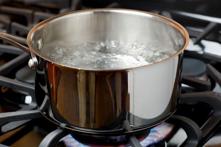 Boiling water on a stove during a boil water notice in Ontario Oregon.