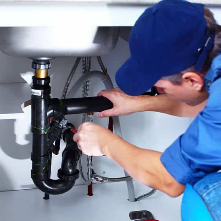 Plumber Pipe Repair Stock Photo for Pipe Plumbing Services