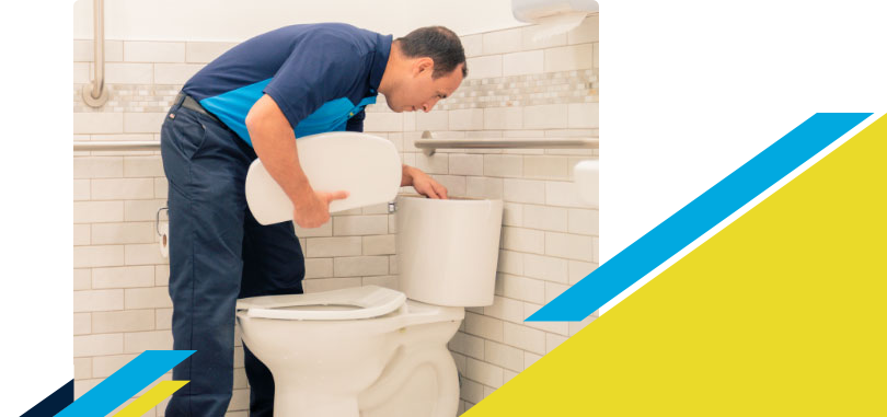 Z PLUMBERZ of Central Long Island technician inspecting top chamber of a toilet
