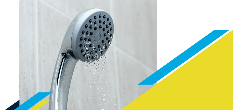 A shower head trickling water